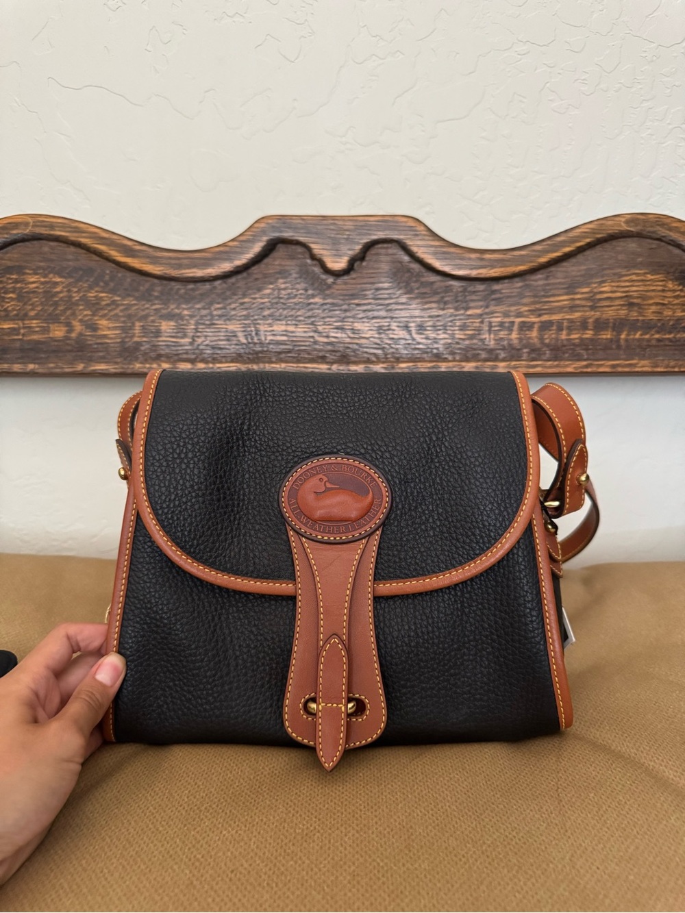 Dooney & Bourke Black Pebbled Leather Messenger with Brown Trim